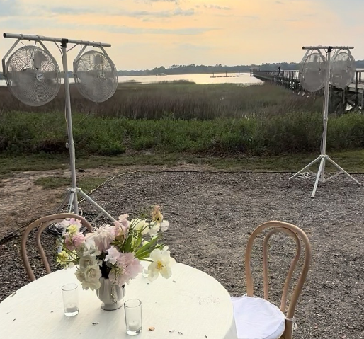 All-Mist fans at a sunset waterfront event