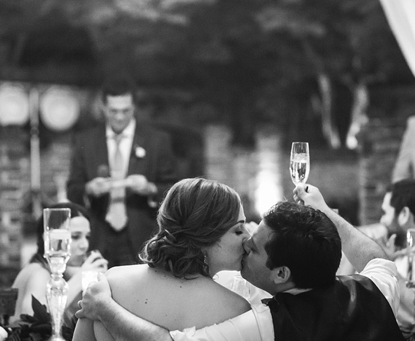 Couple sharing a moment at a reception cooled by All-Mist